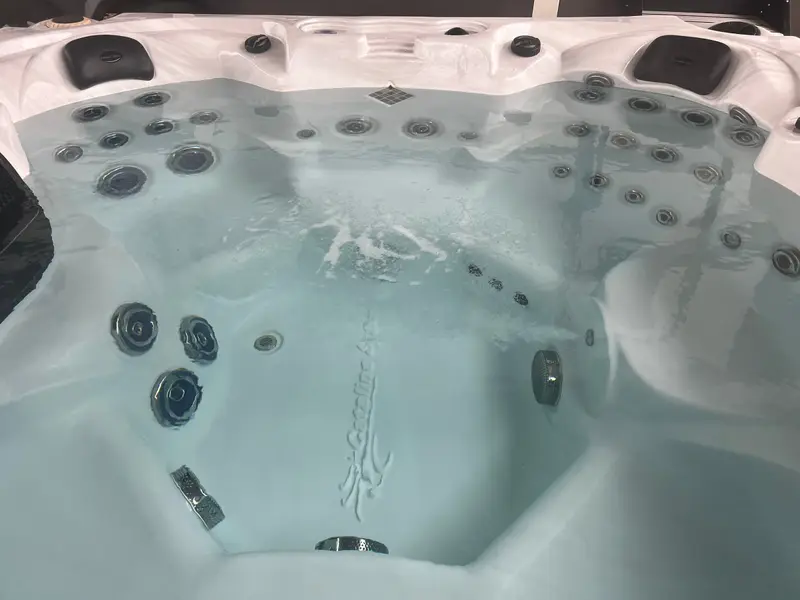 White shell with rows of jets